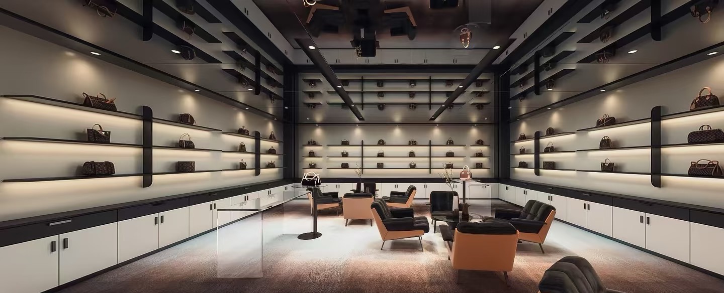 The TIMEREBRON showroom — watches and leather goods displayed in warm, museum-style lighting