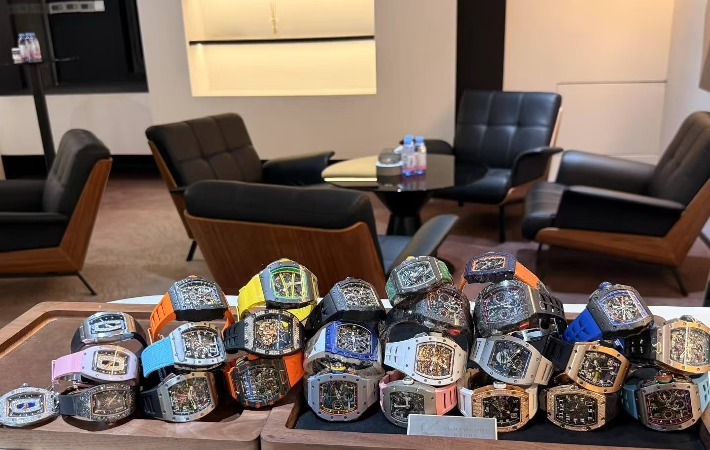 A close-up of pre-owned watches laid out for inspection at TIMEREBRON